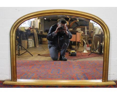 A modern giltwood over mantel mirror, 79 x 119cm 