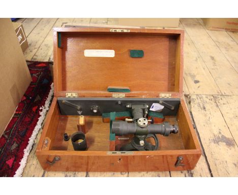 A military issue theodolite by E R Watts & Son, No 38843, in original mahogany box wit label dated 5/10/45, 41cm overall