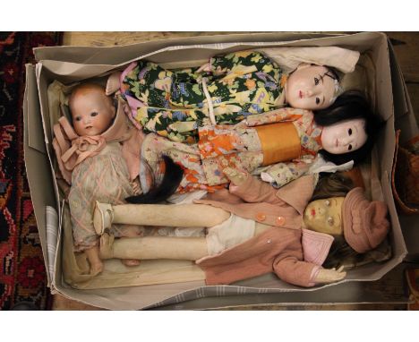 An Armand Marseille My Dream Baby doll, impressed '351/3 K', with sleeping blue eyes and open mouth 34cm long, along with a N