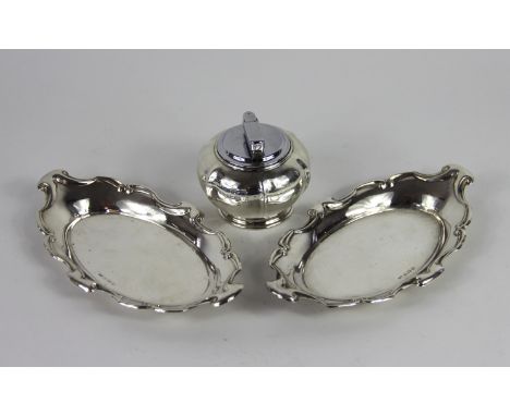 A pair of silver dishes T Wilkinson & Sons, Birmingham 1925, of lozenge shape and scroll rims, 17.5cm wide and a silver mount