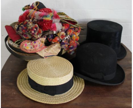 A collection of vintage hats and textiles, to include a Henry Heath top hat, Fred Bingham 16cm high, a G A Dunn & Co Ltd bowl