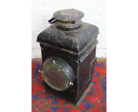 An Adlake Non Sweating lamp, glass cracked to the front