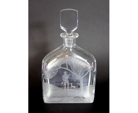 An Orrefors decanter and stopper, the clear crystal, shouldered decanter engraved with a hunting scene and with tablet stoppe