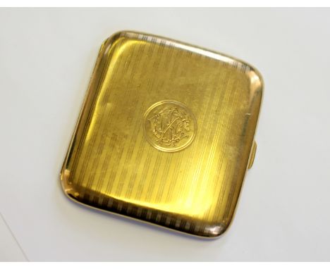A 9ct yellow gold cigarette case, William Neale Chester 1909, with engine turned decoration and engraved monogram, the interi