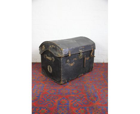 A leather and canvas steamer trunk, with canvas lines interior on castors, with a Brighton to Shrewsbury L&NWR label, 77cm lo