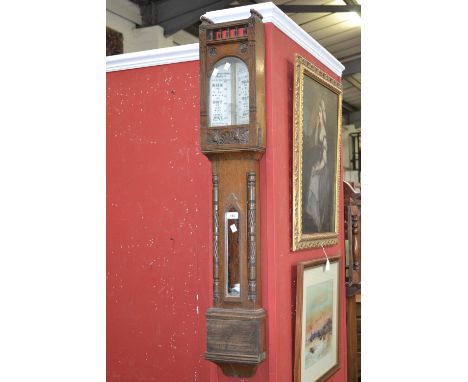 An oak cased M Rhodes & Son mercury barometer.