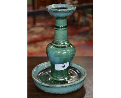 A ceramic oil lamp