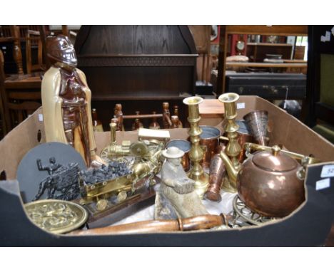 Metalware - a cast iron novelty companion set as a knight; a pair of brass candlesticks; a set of three graduated decorative 
