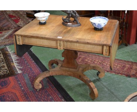 A Regency rosewood and brass marquetry canted rectangular sofa table, crossbanded top above two flush frieze drawers, angular