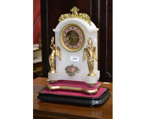 A 19th century alabaster mantel clock