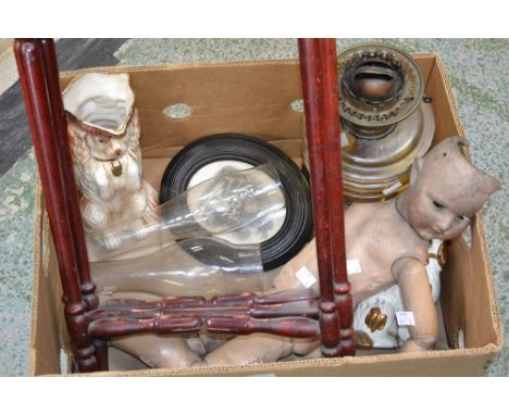 A Victorian oil lamp; a German porcelain doll;  a pair of Staffordshire mantel dogs etc 