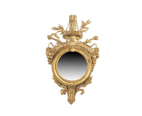 A FRENCH MID 19TH CENTURY CARVED GILTWOOD AND GESSO WALL MIRROR, the circular frame with beaded banding surmounted with a qui