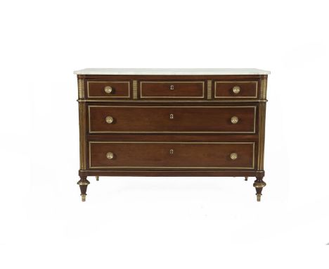 A FRENCH MAHOGANY SHAPED RECTANGULAR COMMODE IN LOUIS SEIZE STYLE with white veined marble top above three long drawers, inse