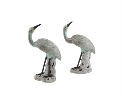 A PAIR OF CHINESE EXPORT PORCELAIN CRANES, 19th Century , Qing DynastyEach modelled in mirror image, in standing position wit