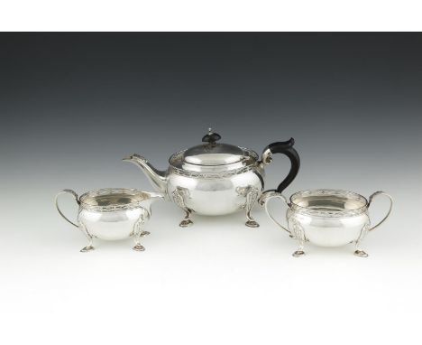 A THREE PIECE SILVER TEA SERVICE, Birmingham 1926, mark of D & B, of oval baluster form with raised pierced gallery rim and c