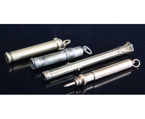 A Sampson Mordan &amp; Co engine turned gilt metal propelling pencil, together with two other examples in gilt metal, and a s