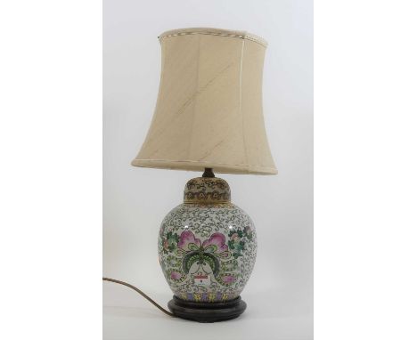 A Chinese porcelain ginger jar of globular form, enamel decorated with flowers and insects, converted into a table lamp, heig