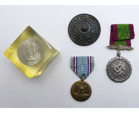 A German Luftschutz-Ehrenzeichen medal together with a US Air Force Efficiency Honour &amp; Fidelity medal, a Winston Churchi