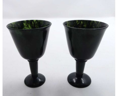 A pair of 20th century spinach jade goblets, h.9cm, boxed 