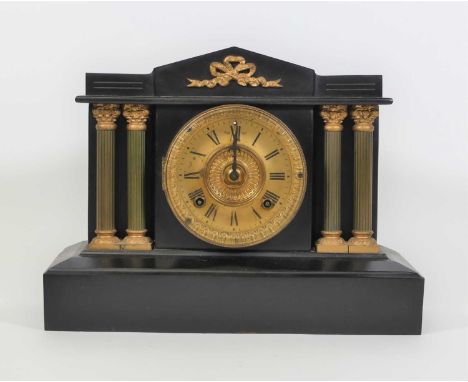 A Victorian black painted metal mantel clock of architectural form, the gilt chapter ring showing Roman numerals, having an e