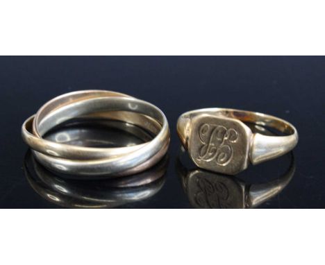 A 9ct gold signet ring, with monogram, size N; together with a 9ct three-colour gold trinity ring (one cut), gross weight 4.7