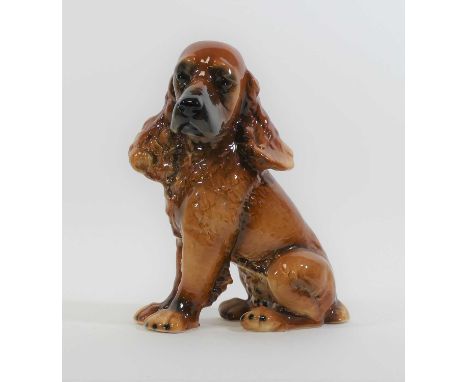 A Goebel German pottery model of a spaniel dog, height 28cmSmall chip to his tail.  Otherwise good.