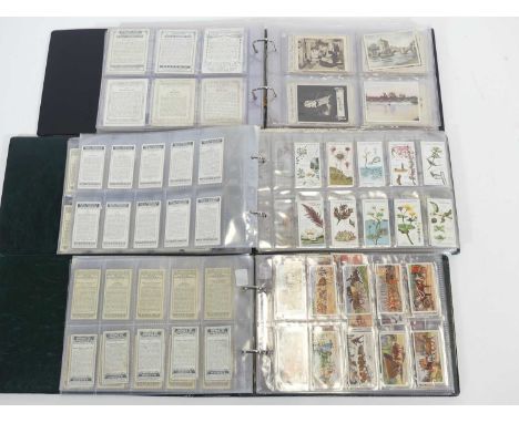 Five albums of cigarette cards, to include Will's Safety First and Railway Engines
