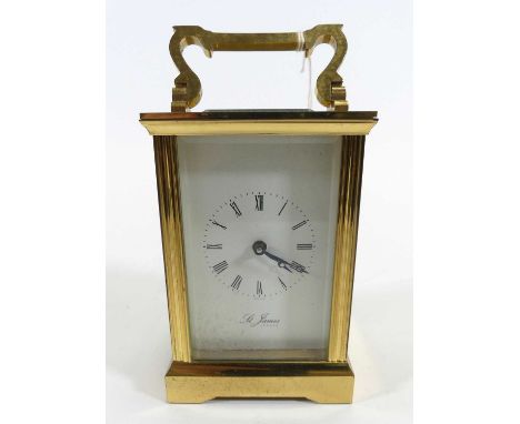 A brass carriage clock, the dial showing Roman numerals, signed St James, London, having visible platform escapement, height 
