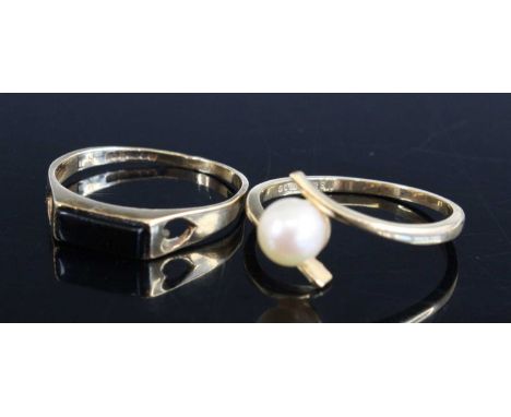 A modern 9ct gold and black onyx set band ring, size L; together with a 9ct gold and cultured pearl set dress ring, gross wei