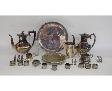 Silver-plated coffee pot and another, a silver-plated tankard with a horn handle, various napkin rings, a small cream jug, a 