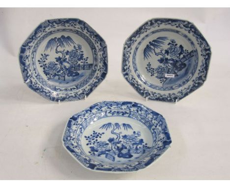 Set of three 18th century/early 19th century Chinese porcelain plates, octagonal with underglaze blue fence, willow and peony