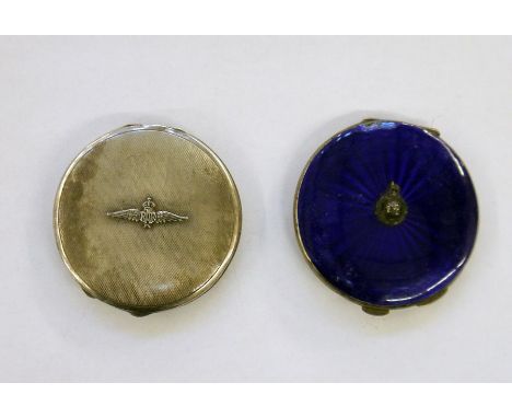 Silver compact of circular form with engine-turned decoration, decorated with the RAF Wings and a silver and blue enamel comp