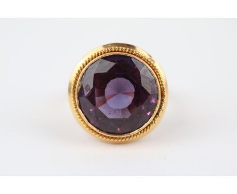 Ladies 18ct Gold Dress ring set with a Large Synthetic Sapphire Size N. 9.7g total weight 