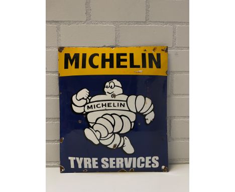 Original Michelin enamel advertising sign showing the text "Tyre Services" at the bottom. All four screw holes are still inta