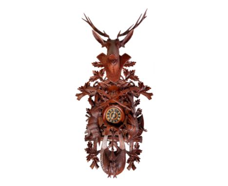 A huge, 2 meter tall Black Forest Cuckoo Clock with a built in cylinder music box. Clocks like this are offten known as Jagds