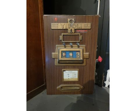 1955 Tivoli mechanical slot machine built by Günter Wulff Apparatebau Germany. The case is in fair condition, the metal trim 