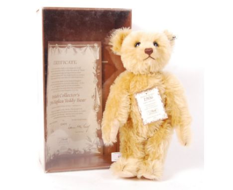 A Steiff made ' 1906 Replica Teddy Bear '. Limited edition of 3,000. Long brown mohair, with inset eyes and pronounced snout.