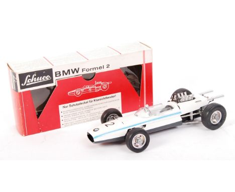 An original vintage Schuco made ' BMW Formel 2 ' ( Formula 2 ) clockwork model racing car. No. 1072. Believed ex-shop stock, 