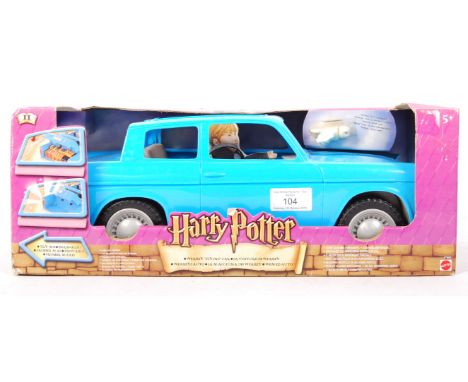 A Mattel made Harry Potter ' Weasley Flying Car ' battery operated playset. Featuring the Ford Anglia, with Hedwig figure. Fa