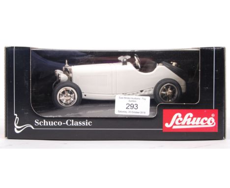 A Schuco Classic made 1:18 scale tinplate clockwork model No. 06000 ' Studio V Mercedes Benz SSK/L '. White, with detailed da