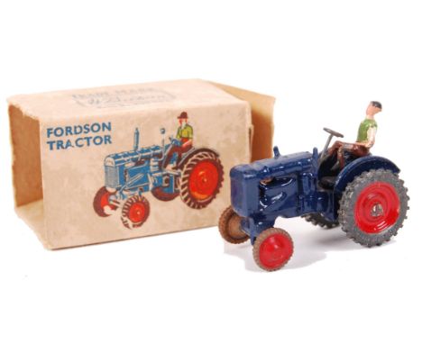 A rare vintage Britains made miniature diecast model ' Fordson Tractor ' No. 604. Blue, with red wheels and miniature steerin