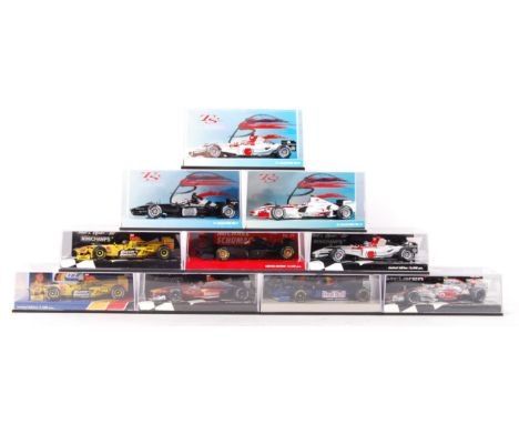 A collection of 10x Minichamps made 1:43 scale precision diecast model Formula One racing cars. All appear mint, unused, with