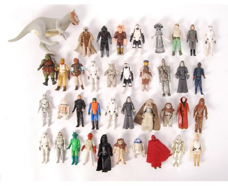 A large collection of approx x40 vintage Kenner / Palitoy Star Wars action figures. Condition from fair to near mint. Figures