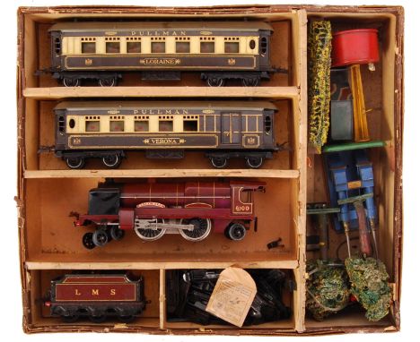 A rare early Hornby Series 0 gauge electric 20v train set, featuring 4-4-2 ' Royal Scot ' 6100 locomotive and tender. Maroon 