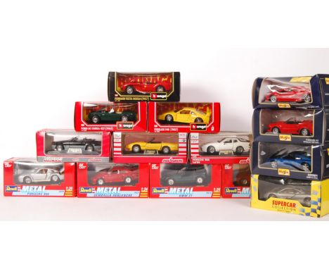 A collection of 14x 1:24 scale precision diecast model cars of various brands; Burago , Revell , Maisto and Majorette. To inc