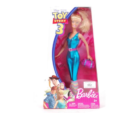 A Mattel made Toy Story 3 ' Barbie ' doll / action figure. Appears mint and unused, within the original box. Unremoved from b