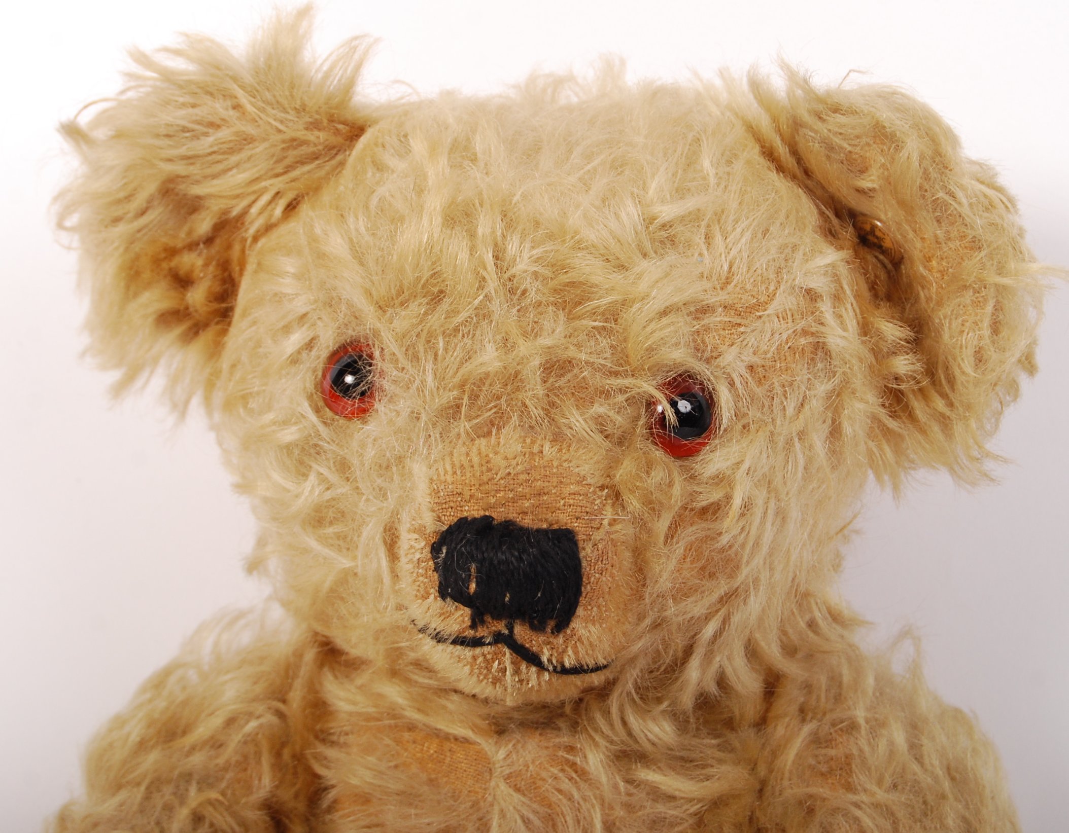 An original vintage 1950’s / 1960’s Merrythought teddy bear. Golden