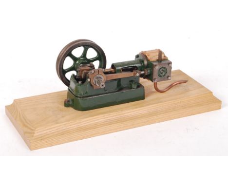 A rare Stuart Turner made horizontal live steam engine, possibly 10H. Green painted, with brass and copper detailing. Working