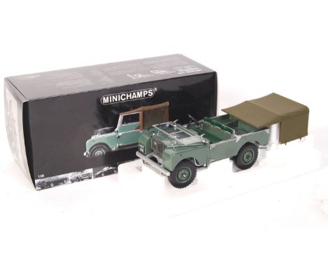 A superb Minichamps made 1:18 scale precision diecast model 1948 Land Rover. Green. Appears mint and unused, within the origi