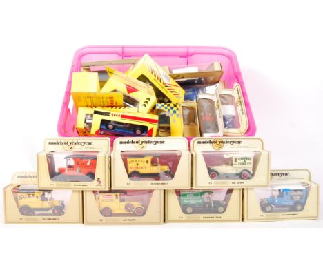 A collection of 35+ assorted scale diecast model vehicles to include Matchbox Models Of Yesteryear and Shell Collection by Ma